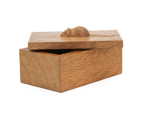 Workshop of Robert Mouseman Thompson (Kilburn): An English Oak Trinket Box and Cover, of rectangular form, the cover with car