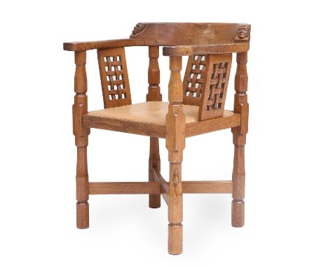 Workshop of Robert Mouseman Thompson (Kilburn): An English Oak Monk's Chair, 1958, with curved back and shaped arms, each sid