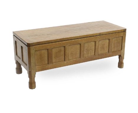 Robert Mouseman Thompson (1876-1955): A Panelled English Oak Blanket Chest, adzed rectangular top with wrought iron hinges an