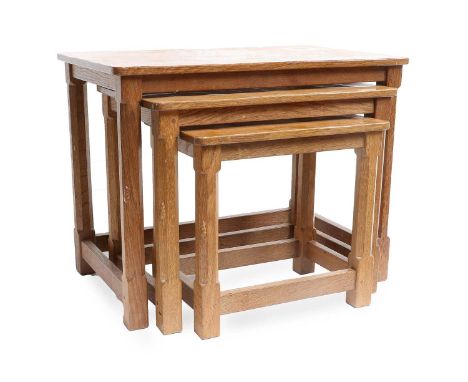 Workshop of Robert Mouseman Thompson (Kilburn): An English Oak Nest of Three Tables, adzed rectangular tops, on four octagona