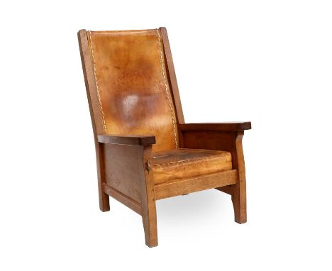 Workshop of Robert Mouseman Thompson (Kilburn): An English Oak Smoking Chair, slung leather back, straight arms, solid seat a