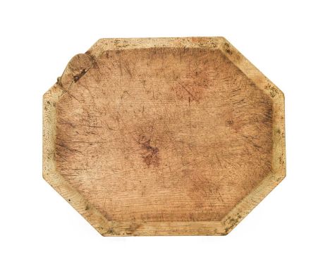 Workshop of Robert Mouseman Thompson (Kilburn): An English Oak Bread Board, of octagonal form, with carved mouse trademark,30