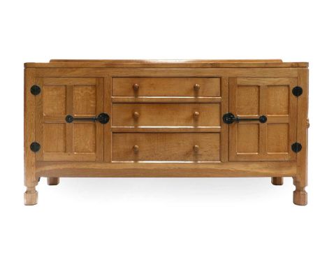 Workshop of Robert Mouseman Thompson (Kilburn): An English Oak 5ft Sideboard, with raised upstand, adzed top, above two doors