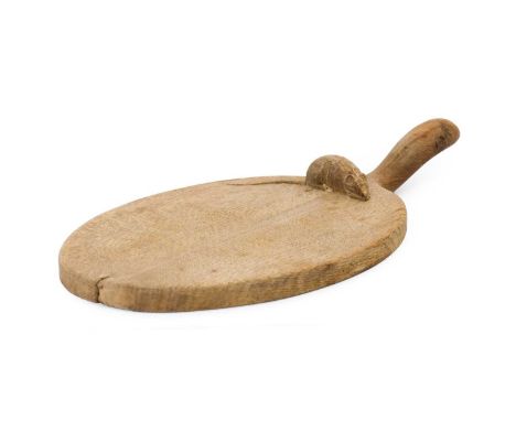 Robert Mouseman Thompson (1876-1955): An English Oak Cheese Board, of standard form, with carved mouse trademark on the board