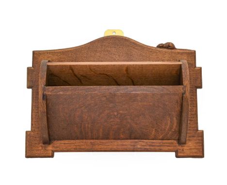 Robert Mouseman Thompson (1876-1955): An English Oak Wall Mounted Letter Rack, with two compartments and shaped back, with ca