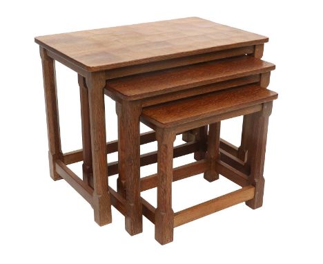 Workshop of Robert Mouseman Thompson (Kilburn): An English Oak Nest of Three Tables, adzed rectangular tops, on four octagona