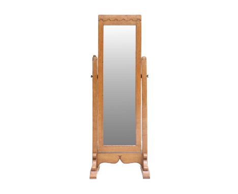 Workshop of Robert Mouseman Thompson (Kilburn): An English Oak 5'2" Long Dressing Mirror, 1958, penny moulded top, with a rec