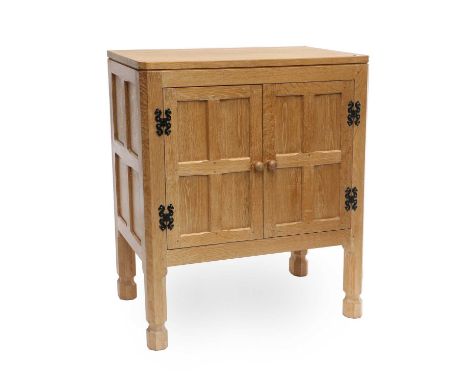 Raymond Webster (1931-2024) (Ilkley): An English Oak Panelled Television Cupboard, the flat top above two doors with knob han