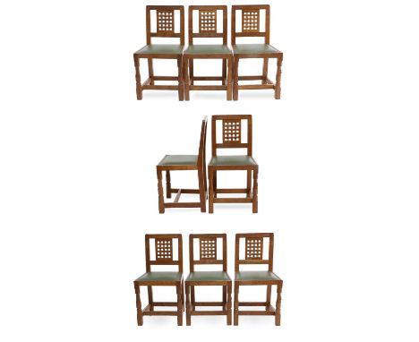 Workshop of Robert Mouseman Thompson (Kilburn): A Set of Eight English Oak Lattice Back Dining Chairs, 2011, green leather up