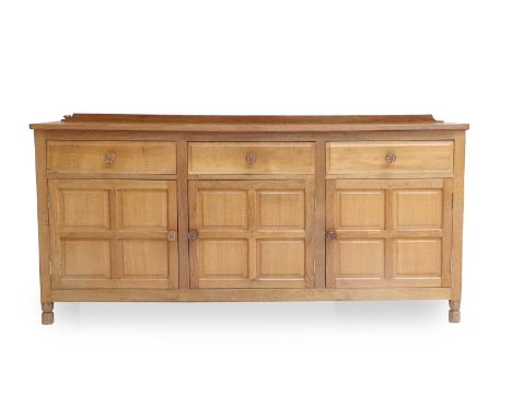 Wren Cabinet Makers: David Hunter (Thirlby): An English Oak Panelled Sideboard, raised upstand, adzed top, above three drawer