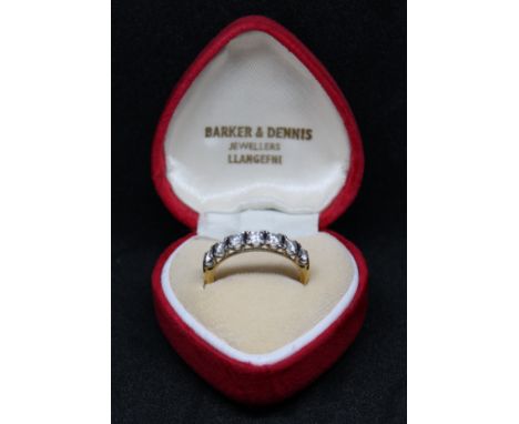 18ct Yellow Gold Seven Stone Round Brilliant Cut Diamond Half Eternity Ring. The Round Brilliant Cut Diamonds measure approx.