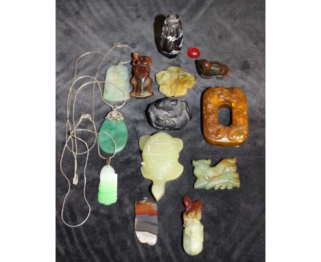 A small collection of Chinese Jade and Hardstone. Carved pendants, snuff bottle, belt slide, carved animals etc.  Thirteen pi
