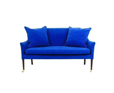 SOFA, Regency design, sapphire blue upholstery with faux bamboo mahogany legs and brass castors, 93cm H x 151cm W.