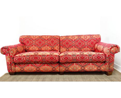 MODULAR SOFA, two parts, in red kilim patterned chenille, 98cm H x 226cm W x 114cm D overall.