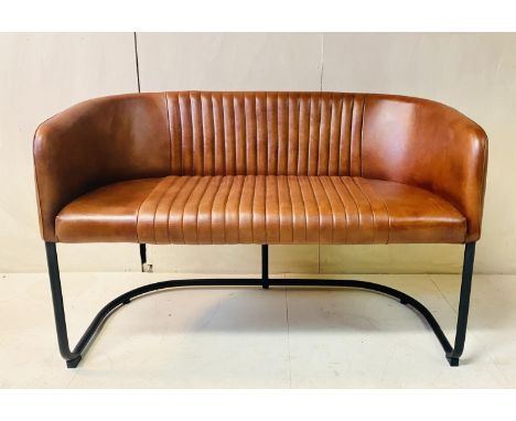 SOFA, 1960s style, tan leather upholstery on tubular black metal supports, 76cm H x 116cm W x 55cm D.