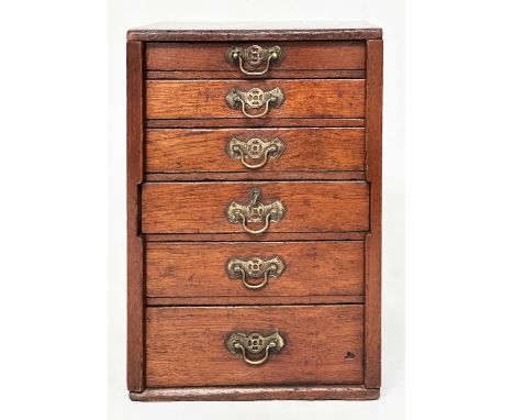WATCHMAKERS CABINET, 19th century mahogany with six graduated drawers, locking stiles and an impressive selection of high qua