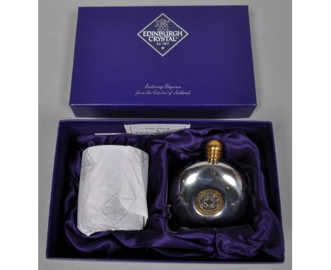 A boxed Edinburgh crystal hip flask and whisky glass set