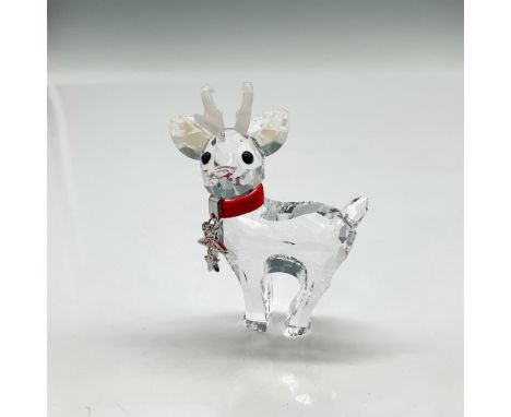 Created from clear faceted crystal, frosted antler, black crystal button eyes wearing a red collar adorned with rose rhinesto