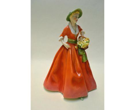 Fine bone china, glazed, modelled by F. G. Doughty for Royal Worcester, featuring Spring Morn. A Lady Figurine, dressed in a 