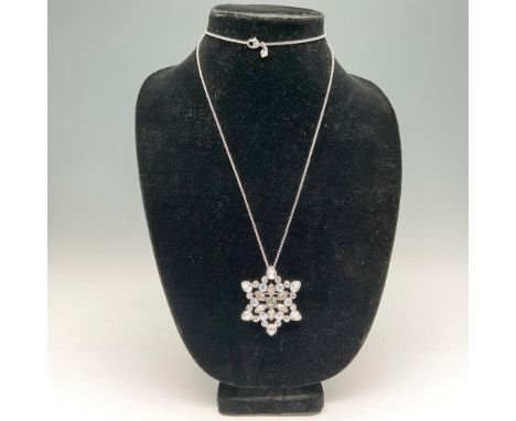Rhodium plated rhinestone crystal snowflake designed necklace-pin with center smokey crystal, topaz and clear crystal surroun