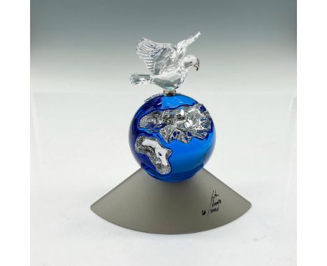 Peace dove mounted on top of the blue planet for this 2000 World Peace Millenium edition. Artist signed base. Swarovski backs