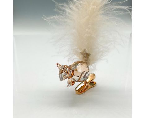 Part of the Merry Christmas theme. Figural is designed in amber crystal holding a star with his crystal bushy feather tail at
