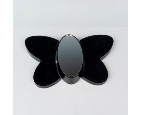 A set of 5 display stands made to resemble a butterfly when placed together, including a center reflective stand, and 4 black