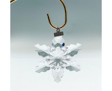 Dazzling star or snowflake shaped tree ornament in clear faceted crystal. Swarovski mark. This item has its original box: 5.5