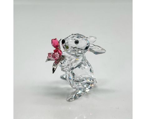 Clear faceted crystal figural holds Indian Pink crystal flowers with rhodium leaves and stems. Swarovski backstamp. 1177251. 