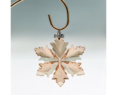Dazzling star or snowflake shaped tree ornament in goldtone crystal. Swarovski mark. This item has its original box: 5.5"L x 