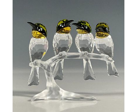 Exceptional set of 4 bee-eaters on a branch figurine that was part of the Feathered Beauties collection. Inspired by nature, 