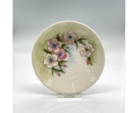 Small pleasant dish decorated with pink flowers, light sage background. Moorcroft backstamp. Dimensions: 0.75"H x 4.75" diaMa