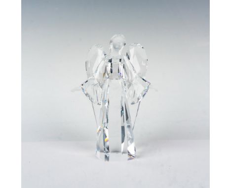 Beautiful, clear faceted body has frosted face and hands. Swarovski backstamp. This item has its original box which measures 