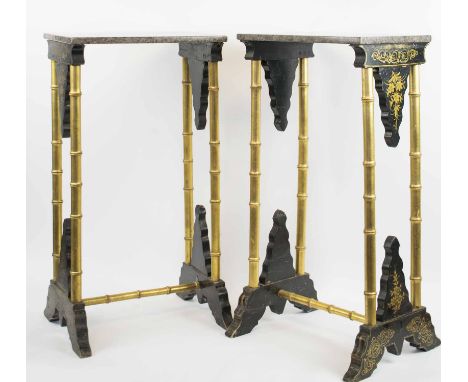 LAMP TABLES, a pair, late 19th century in the Regency manner, ebonised and gilt decorated with faux bamboo supports and grey 