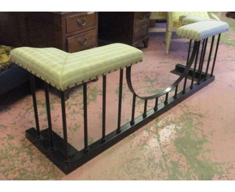 CLUB FENDER, black metal framed with green check and yellow striped upholstered seat pads, 159cm L x 53cm H x 43cm D. (with f