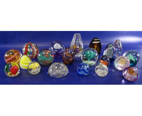 Assorted glass paperweights to include Caithness 'Cauldron', Caithness 'Pebble', Caithness 'Cascadia' and others, some unmark