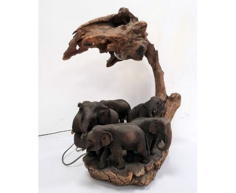 Statement table lamp constructed from driftwood and with a family of carved wooden elephants, approx. 51cm high