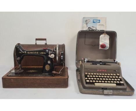 Royal De-Luxe portable typewriter in carrying case and with instructions and a Singer sewing machine&nbsp;