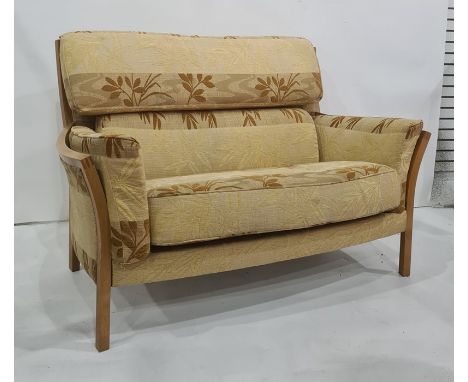 Three seater and two seater sofa by Ercol in a gold ground foliate patterned upholstery (3)