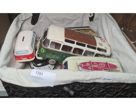 A biscuit tin formed as a Campervan, a tin model of a campervan , a ceramic model campervan moneybox, and other related items