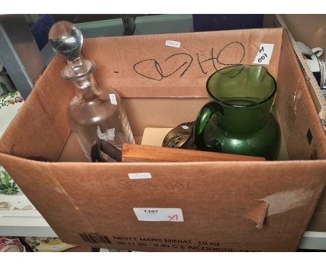 Horse brasses on a leather, a green glass jug, a decanter, a framed fishing fly (1 box)