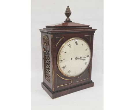 Regency mahogany twin-fusee bracket clock with Roman numerals to the painted dial, a brass acorn surmounting the top, all on 
