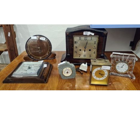 Waterford crystal mantel clock with Roman numeral dial, 13cm high, a Junghans Automat mantel clock, a 20th century Smiths man