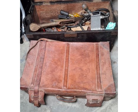 Vintage leather suitcase and a small wooden trunk filled with assorted vintage tools