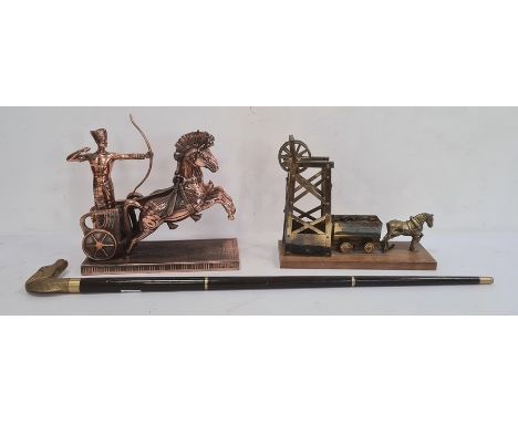 Copper model of an Egyptian chariot rider and a brass model of a pit pony and winch and a walking stick with brass horse hand