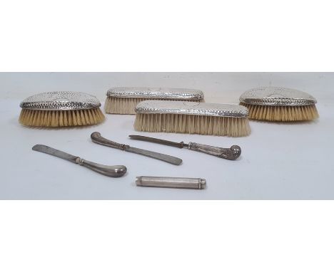 Edwardian silver four-piece brush set by Charles Fox & Co Ltd, London 1908, a silver engine-turned pencil outer case by Samps