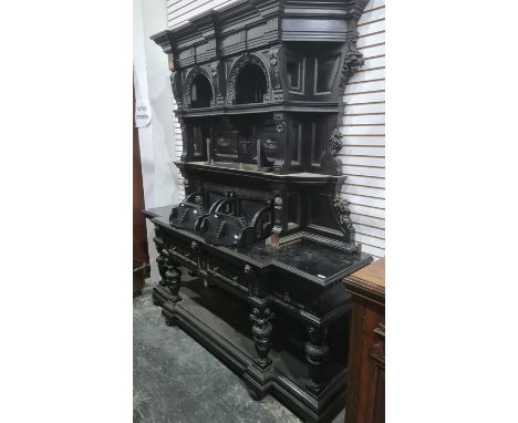 19th century ebonised dresser with cavetto moulded cornice above assorted shelves, to breakfront base with four drawers and s