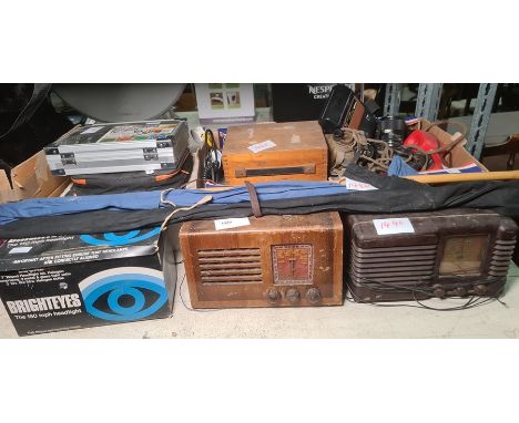 Two vintage radios, a boxed Lucas headlight x 2, vintage a volt watt meter, a WWII pilot's communication mask, Polaroid camer