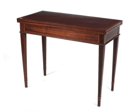 An attractive 19th Century mahogany and inlaid satinwood fold-over Card Table, with decorated frieze on square tapering legs.