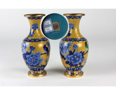 A pair of very attractive Chinese yellow ground cloisónne enamel Vases, decorated with flowers and birds each with a seal mar